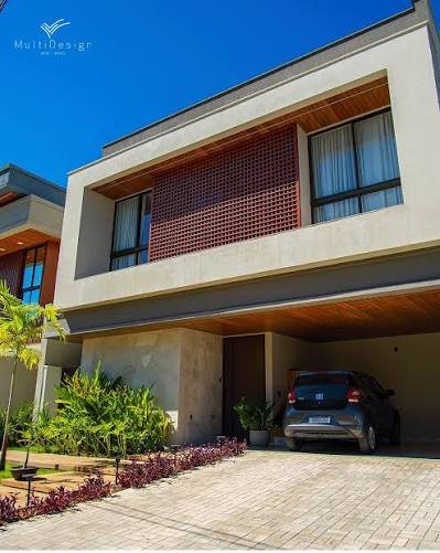 Fachada em ACM e ripado de alumínio — projeto residencial