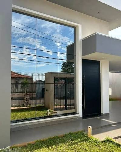 Fachada em pele de vidro — projeto residencial