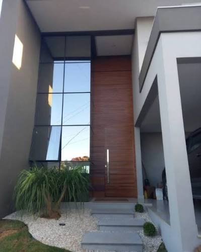 Fachada em pele de vidro — projeto residencial